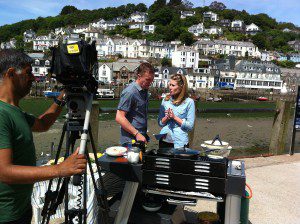 James Tanner preparing to cook Looe harbour-side